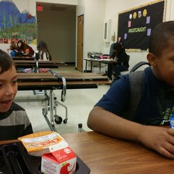 Griegos Elementary School - Boys eating breakfast
