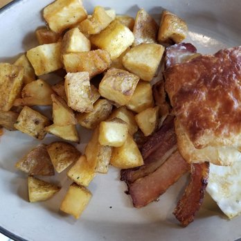 Mallard Cottage - Breakfast sandwich with bacon and a side of hasbrowns. - Canadian (New) Near Me - St. John's, Newfoundland and Labrador