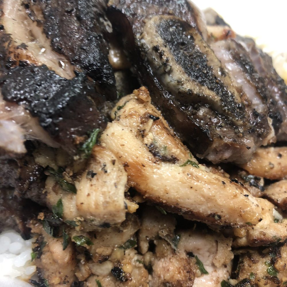 Kau Kau Grill - Chicken and ribs combo under a bed of rice. - Barbeque Near Me - Honolulu, Hawaii