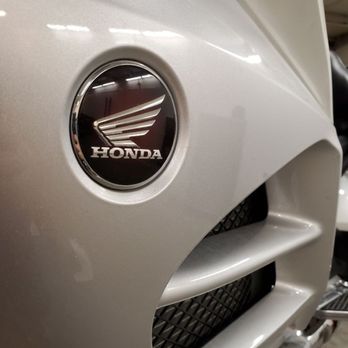 MotoFix - Honda emblem on left radiator cover. - Motorcycle Repair Near Me - Denver, Colorado