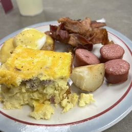 Some brunch offerings...breakfast casserole, kielbasa, eggs Benedict, and bacon. Plenty of bacon. Some brunch offerings...breakfast casserole, kielbasa, eggs Benedict, and bacon. Plenty of bacon.