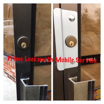 Prime Locksmith Mobile Service - Commercial Latch Protector installed on an aluminum store front door in Randolph MA to protect against and deter break ins - Keys & Locksmiths Near Me