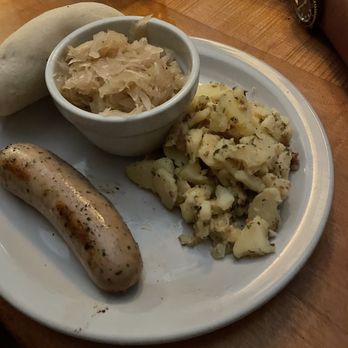 The Bier Garden - Sausage platter with German potato salad and sauerkraut - German Near Me - Portsmouth, Virginia