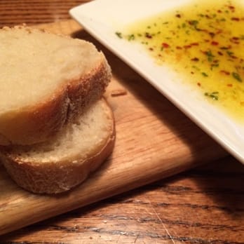 Brickhouse Pizza Pub - Bread & garlic/chili dipping oil brought to the table. - Pizza Near Me - Fort Atkinson, Wisconsin Brickhouse Pizza Pub - Bread & garlic/chili dipping oil brought to the table. - Pizza Near Me - Fort Atkinson, Wisconsin