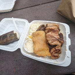 Musubi and a Bento plate with rice, fish, chicken, beef and spam. Musubi and a Bento plate with rice, fish, chicken, beef and spam.