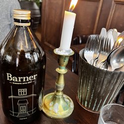 Brasserie Barner - Sparkling water - house brand - and a proper candle