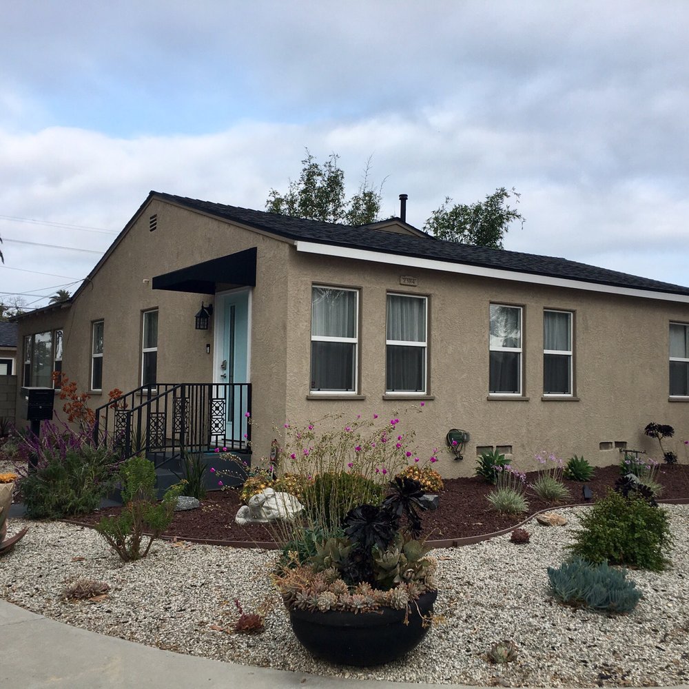 Love the new black roof that makes my house look new again!
