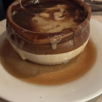Dutch's Daughter - Hubby's appetizer was French Onion soup. I'm not into onions, but I tasted the broth, the bread and the cheese and it was very good. - Seafood Near Me - Frederick, Maryland