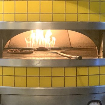 California Pizza Kitchen - The pizza oven view from the bar - Pizza Near Me - Aiea, Hawaii California Pizza Kitchen - The pizza oven view from the bar - Pizza Near Me - Aiea, Hawaii
