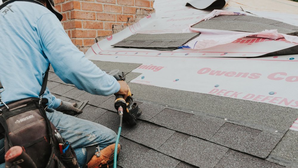 Slide of Red Bull Roofing Solutions