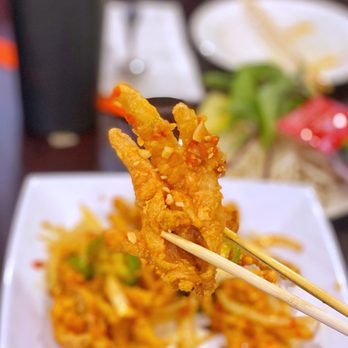 AK Kitchen - a plate of fried food with chopsticks - Vietnamese Near Me - San Jose, California AK Kitchen - a plate of fried food with chopsticks - Vietnamese Near Me - San Jose, California