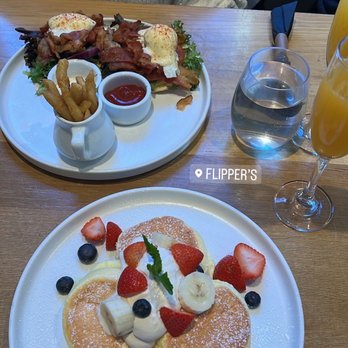 Flipper’s - Eggs Benedict & fruit pancakes with the spring mimosas - Pancakes Near Me - New York, New York
