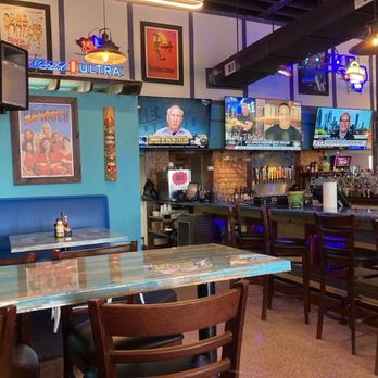 The Salty Dolphin - Inside. U- shaped bar area. - Golf Cart Rentals Near Me - Rockport, Texas The Salty Dolphin - Inside. U- shaped bar area. - Golf Cart Rentals Near Me - Rockport, Texas