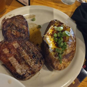Rafferty's - Chops with fully loaded potato - American Near Me - Cordova, Tennessee