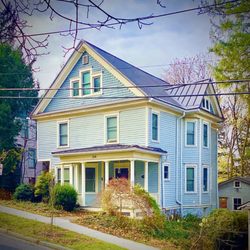 Top Notch Roofing Pros - vertical seam metal roof