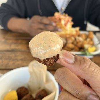 Brown Bag Seafood - Hush Puppies with the Aioli - Seafood Near Me - Atlanta, Georgia Brown Bag Seafood - Hush Puppies with the Aioli - Seafood Near Me - Atlanta, Georgia