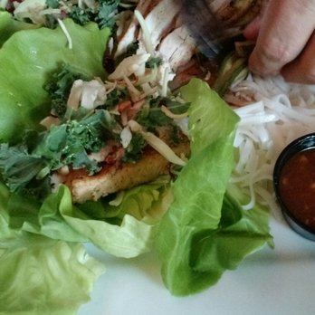Main Streets Café - Thai chicken wraps.  The person who ordered these couldn't keep this hands off long enough to take the picture - American Near Me - Concord, Massachusetts