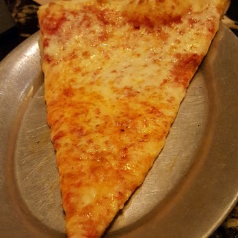 Rocco's - huge slice cheese pizza .so delicious - Bars Near Me - Seattle, Washington