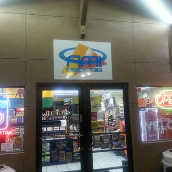 BP - a store front with a neon sign above the door - Gas Stations Near Me - Niceville, Florida