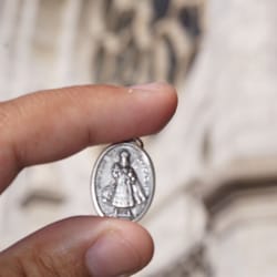 Sacred Heart Book Store - A little pendant of the Infant Jesus of Prague purchased from the book store.