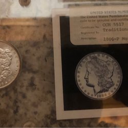L & B Coins & Collectibles - Morgan dollar in early holder