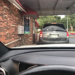Dairy Queen Store - going through the drive through.