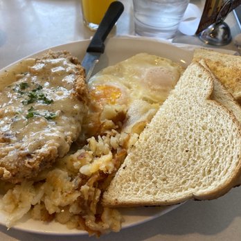 Silver Grill Cafe - Country Fried Steak, over easy eggs, hash browns and sourdough toast. - Breakfast & Brunch Near Me - Fort Collins, Colorado