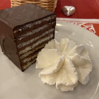 Andre’s Confiserie Suisse - Dobosh torte, delicious but slightly dry sponge - Bakeries Near Me - Kansas City, Missouri Andre’s Confiserie Suisse - Dobosh torte, delicious but slightly dry sponge - Bakeries Near Me - Kansas City, Missouri