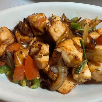 Eri Star Cafe - Cubed salmon delicately flavoured with tomato, onion, and rosemary -- all specially prepared for an appreciator of mildness .... - Eritrean Near Me - Silver Spring, Maryland Eri Star Cafe - Cubed salmon delicately flavoured with tomato, onion, and rosemary -- all specially prepared for an appreciator of mildness .... - Eritrean Near Me - Silver Spring, Maryland