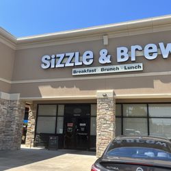 Sizzle & Brew - Located in a shopping center with plenty of parking