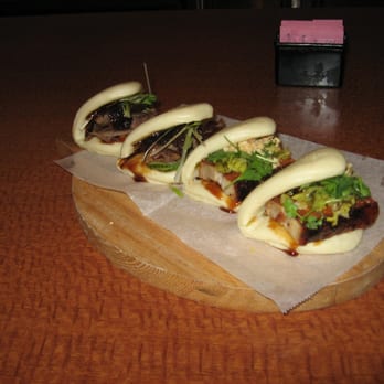 Fat Choy - Two duck bao (left) and two pork belly bao (right). - New American Near Me - Las Vegas, Nevada Fat Choy - Two duck bao (left) and two pork belly bao (right). - New American Near Me - Las Vegas, Nevada