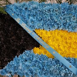 Camille's Floral Designs - She was able to design the Bahamian flag
