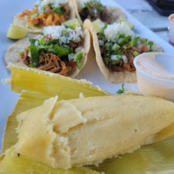 La Placita - Corn tamale, shredded beef and shredded chicken tacos, and spicy beef taco.