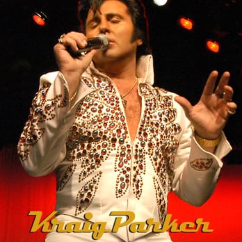 Plaza Arts Center - a man in a white suit singing into a microphone - Venues & Event Spaces Near Me - Carrollton, Texas Plaza Arts Center - a man in a white suit singing into a microphone - Venues & Event Spaces Near Me - Carrollton, Texas
