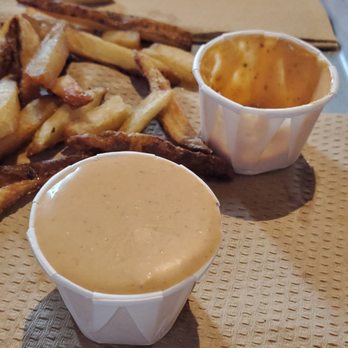 Humble Burger - The provided sauce cup and the extra one I bought. Weird fry sauce, maybe good for drunk people. - Burgers Near Me - Moscow, Idaho