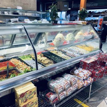 Bagel Cafe - a display of a variety of food items - Bagels Near Me - Staten Island, New York