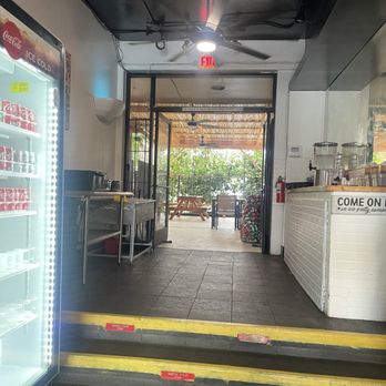 Ohana Q - Extra seating outside. Very clean. There is also a water dispenser with cold water. - Barbeque Near Me - Kailua-kona, Hawaii