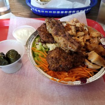 Paprika Grill - Mixed Grill Rice Bowl with a side of grape leaves - Mediterranean Near Me - Salem, Massachusetts Paprika Grill - Mixed Grill Rice Bowl with a side of grape leaves - Mediterranean Near Me - Salem, Massachusetts