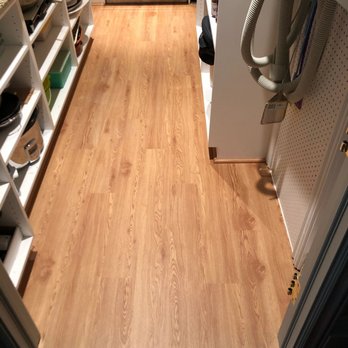 Generation Floors - a kitchen with a wood floor - Flooring Near Me - Kaysville, Utah