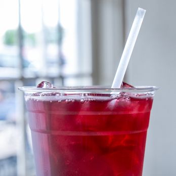 Mill Street Cafe - a red drink with a straw in a plastic cup - Coffee & Tea Near Me - Round Top, Texas Mill Street Cafe - a red drink with a straw in a plastic cup - Coffee & Tea Near Me - Round Top, Texas