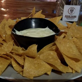 Azucar Lounge - Queso Blanco: jalapeno, parmesan sauce, house made tortilla chips ($9.50) - Lounges Near Me - San Francisco, California Azucar Lounge - Queso Blanco: jalapeno, parmesan sauce, house made tortilla chips ($9.50) - Lounges Near Me - San Francisco, California