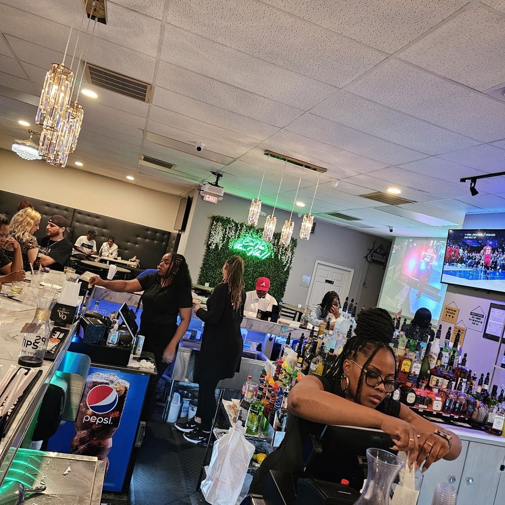 ENVEE Restaurant & Bar - Ladies working the bar - Fish & Chips Near Me - Columbia, South Carolina ENVEE Restaurant & Bar - Ladies working the bar - Fish & Chips Near Me - Columbia, South Carolina