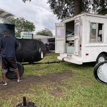 Graham Boy's BBQ - a man standing in front of a food truck - Barbeque Near Me - Groveland, Florida Graham Boy's BBQ - a man standing in front of a food truck - Barbeque Near Me - Groveland, Florida