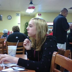 Los Jarritos Restaurants - Dining area and my daughter.