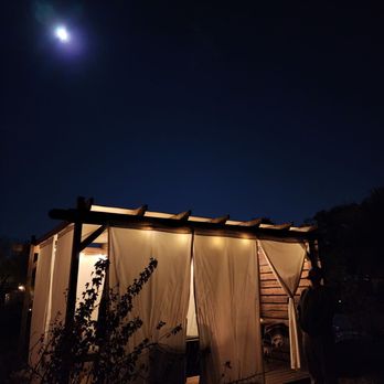 Farm & Table - a man standing in front of a shed at night - New American Near Me - Albuquerque, New Mexico