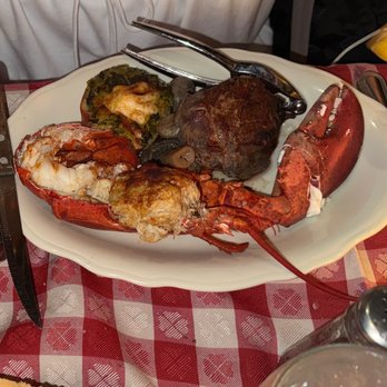 The Lobster House - Surf and turf (port and starboard) 1/2 lobster, filet, grilled stuffed tomato - Seafood Markets Near Me - Cape May, New Jersey The Lobster House - Surf and turf (port and starboard) 1/2 lobster, filet, grilled stuffed tomato - Seafood Markets Near Me - Cape May, New Jersey