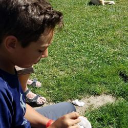 Landon enjoying his cookies n cream with Butters nearby