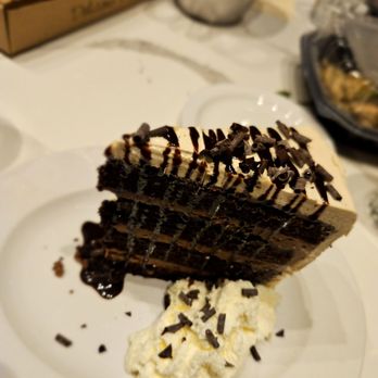 Tuscan Brick Oven Bistro - a slice of chocolate cake - Italian Near Me - Freeport, Maine Tuscan Brick Oven Bistro - a slice of chocolate cake - Italian Near Me - Freeport, Maine