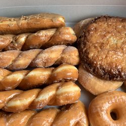 Scotty's Donuts - Glazed, Sugar, cake donuts, and apple fritter.