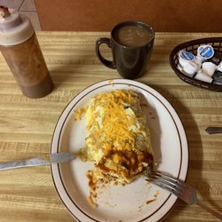 Elvira's  Cafe - Breakfast omelette, with their incredible red sauce. Other sauce had a heavy kick